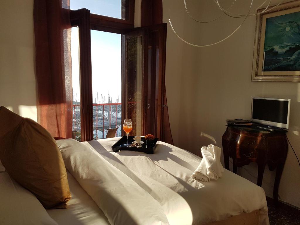 TV a/nebo společenská místnost v ubytování Hotel Mignon