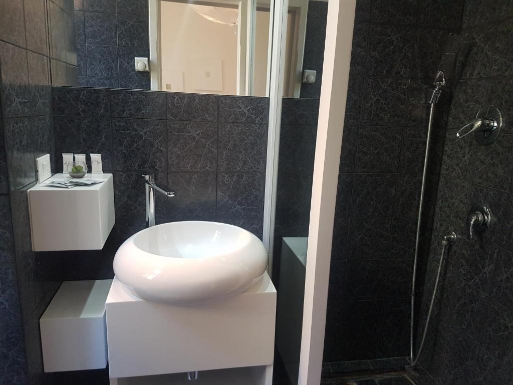 Koupelna v ubytování Hotel Mignon