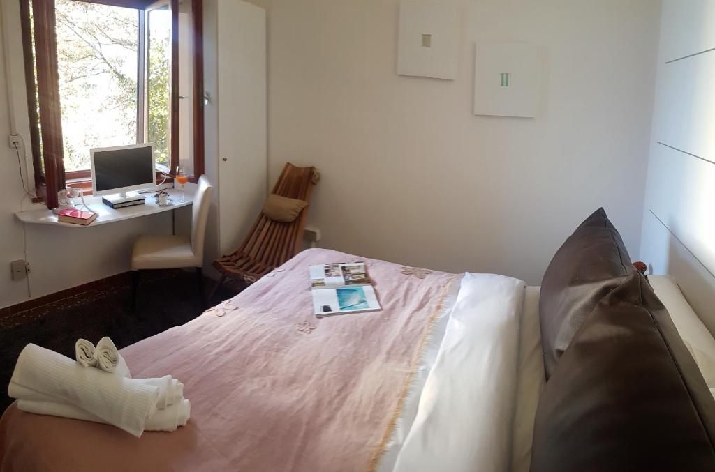 Postel nebo postele na pokoji v ubytování Hotel Mignon