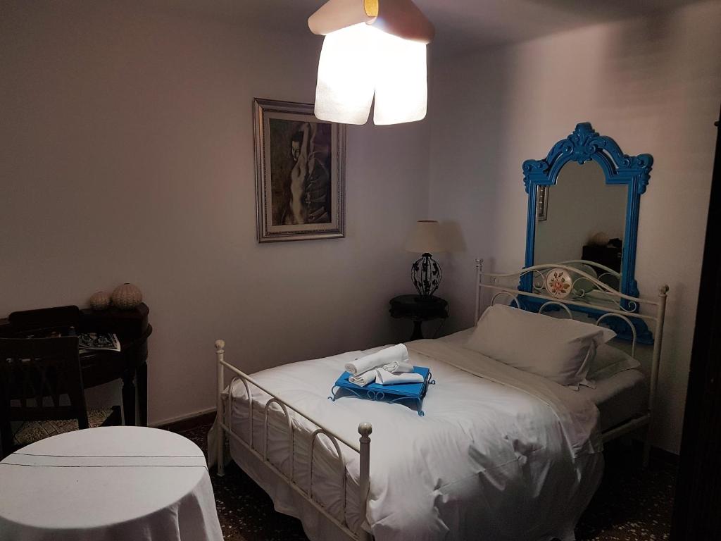 Postel nebo postele na pokoji v ubytování Hotel Mignon