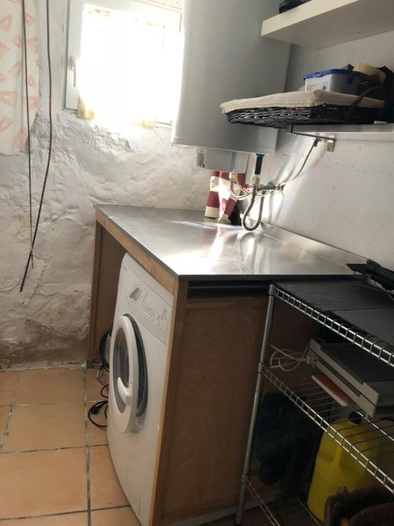 Kuchyň nebo kuchyňský kout v ubytování Casa María