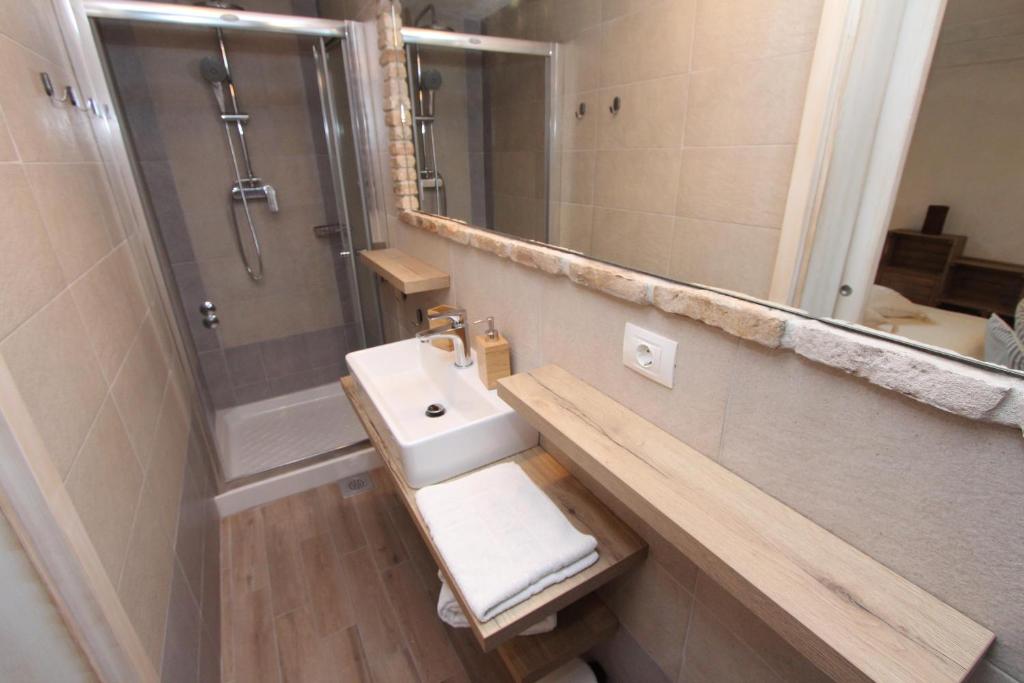 Kúpeľňa v ubytovaní Apartments Midea 2