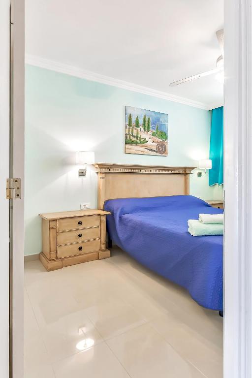 Postel nebo postele na pokoji v ubytování Apartamento Altamira