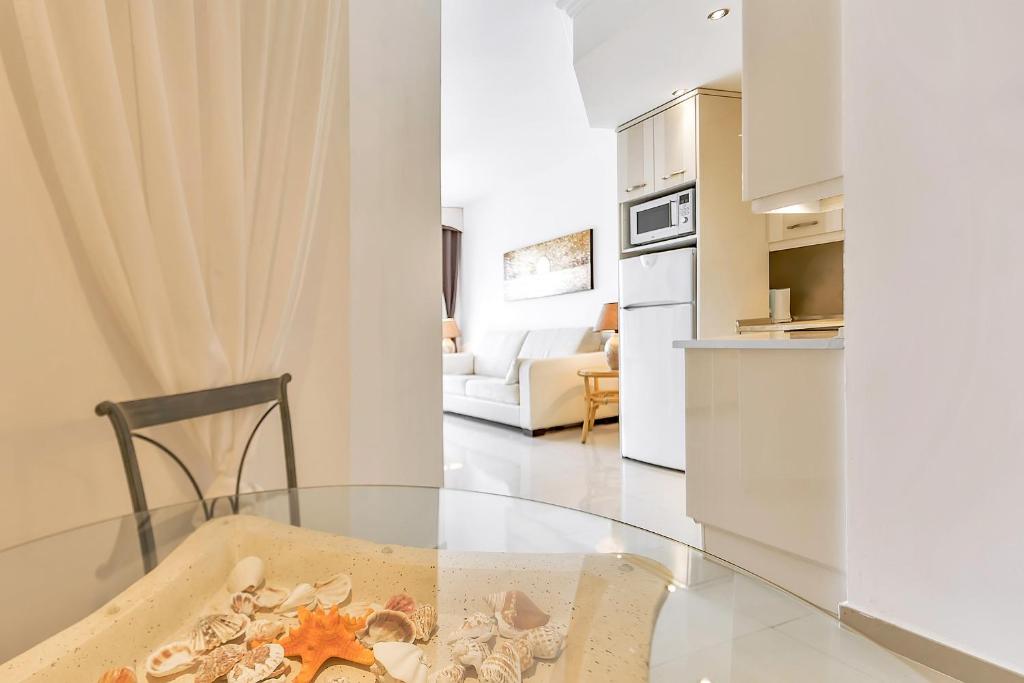 Kuchyň nebo kuchyňský kout v ubytování Apartamento Altamira