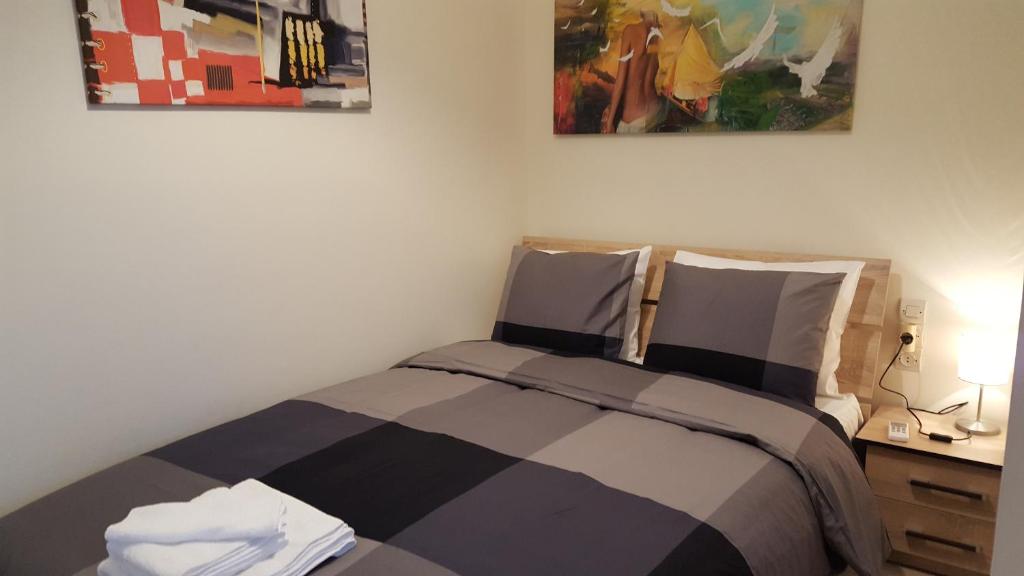 Posteľ alebo postele v izbe v ubytovaní Patras Port apartment