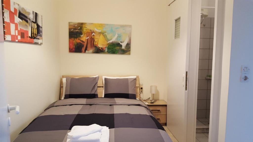 Posteľ alebo postele v izbe v ubytovaní Patras Port apartment