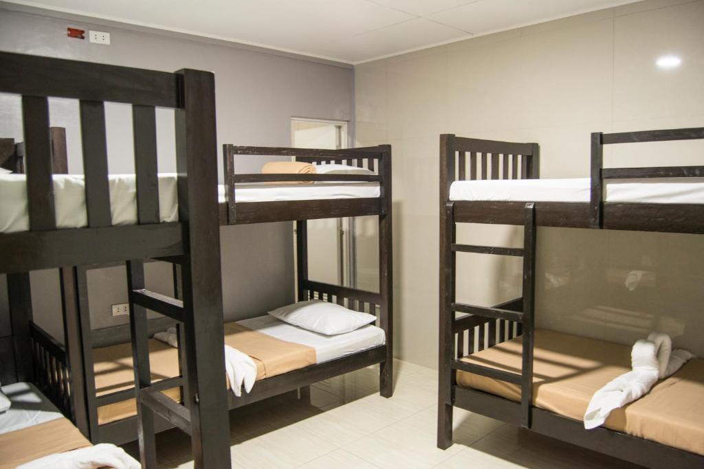 Postel nebo postele na pokoji v ubytování ParmView Inn