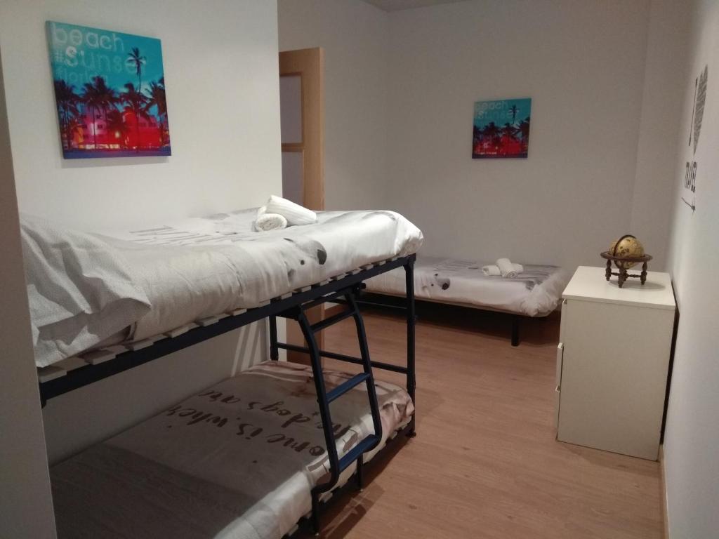 Postel nebo postele na pokoji v ubytování Apartamento Gabierrota