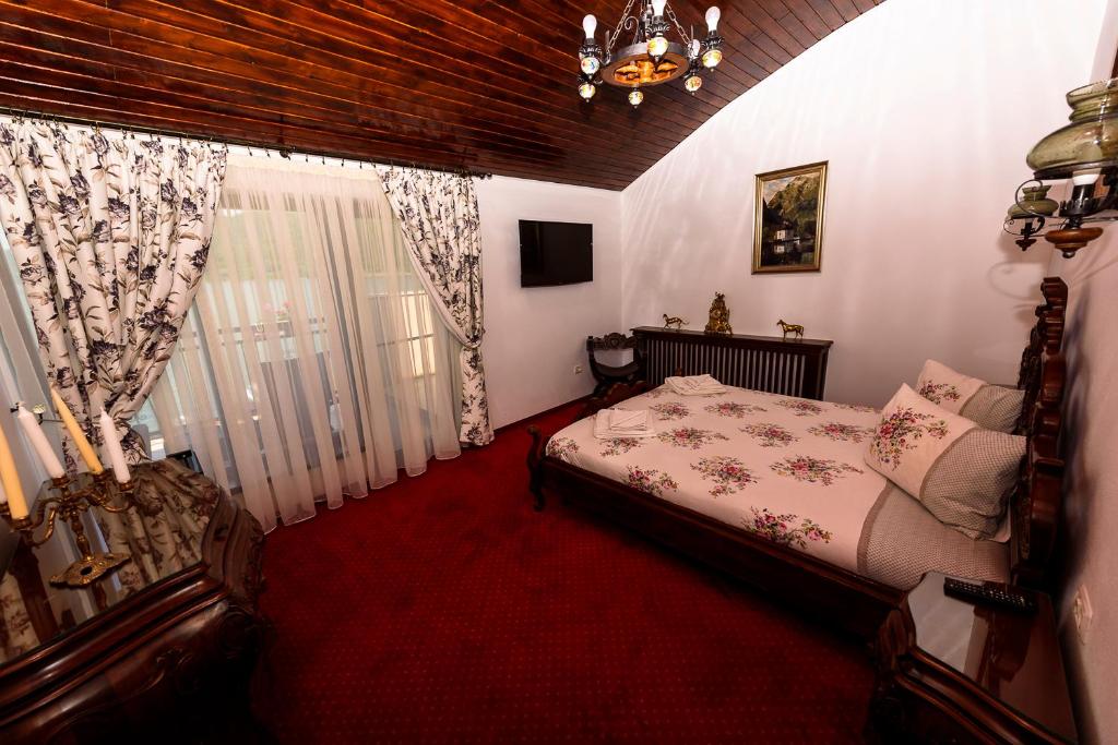 Postel nebo postele na pokoji v ubytování Casa Andrei