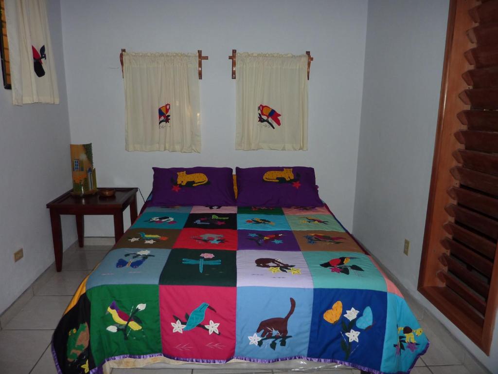 Postel nebo postele na pokoji v ubytování Villas Pico Bonito