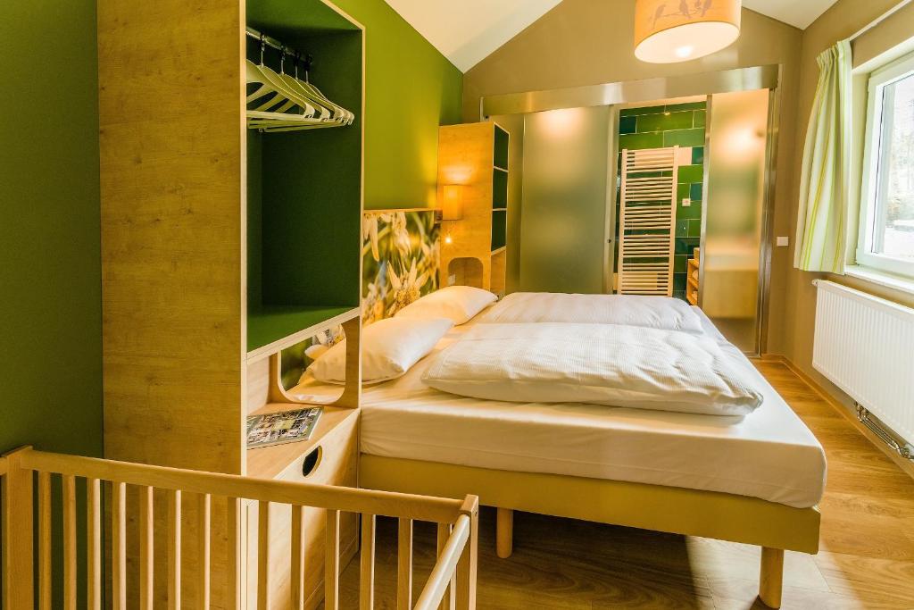 Postel nebo postele na pokoji v ubytování Center Parcs Park Allgäu