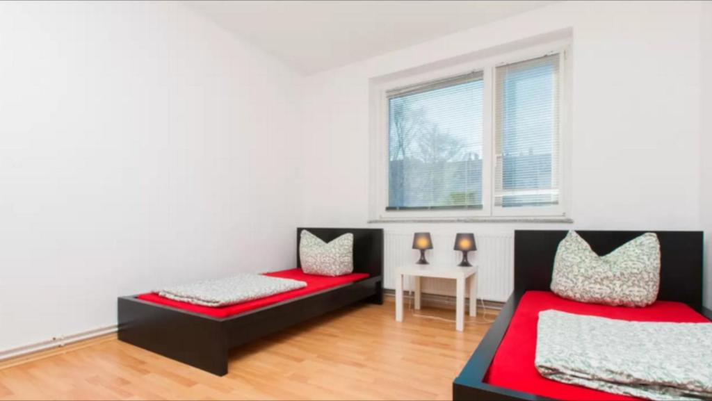 Posteľ alebo postele v izbe v ubytovaní City Apartment 6 Personen