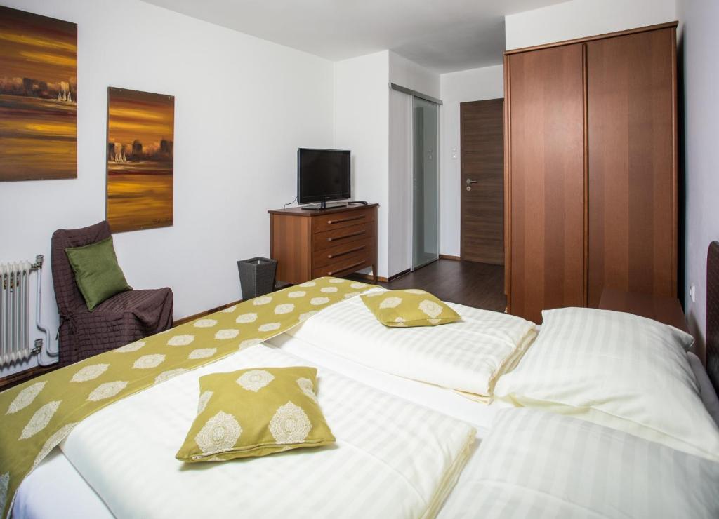Voodi või voodid majutusasutuse Hotel Faaker See Inn by S4Y toas