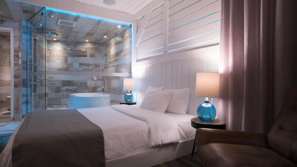 Postel nebo postele na pokoji v ubytování Hôtel Le Rivage