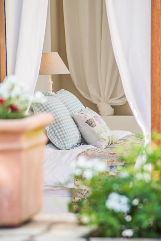 Postel nebo postele na pokoji v ubytování Amboula Beach Apartments