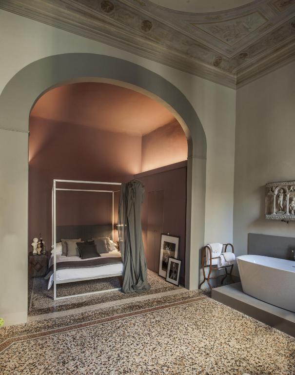 Postel nebo postele na pokoji v ubytování Casa Botticelli
