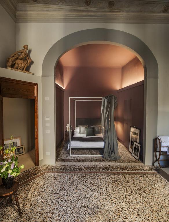 Postel nebo postele na pokoji v ubytování Casa Botticelli