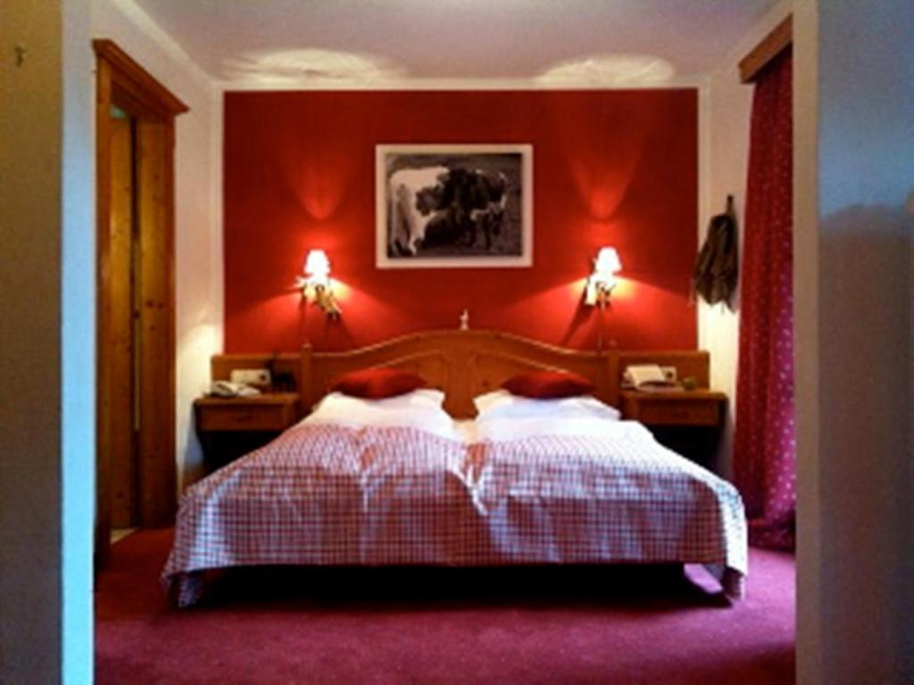 Postel nebo postele na pokoji v ubytování Hotel Gamshof