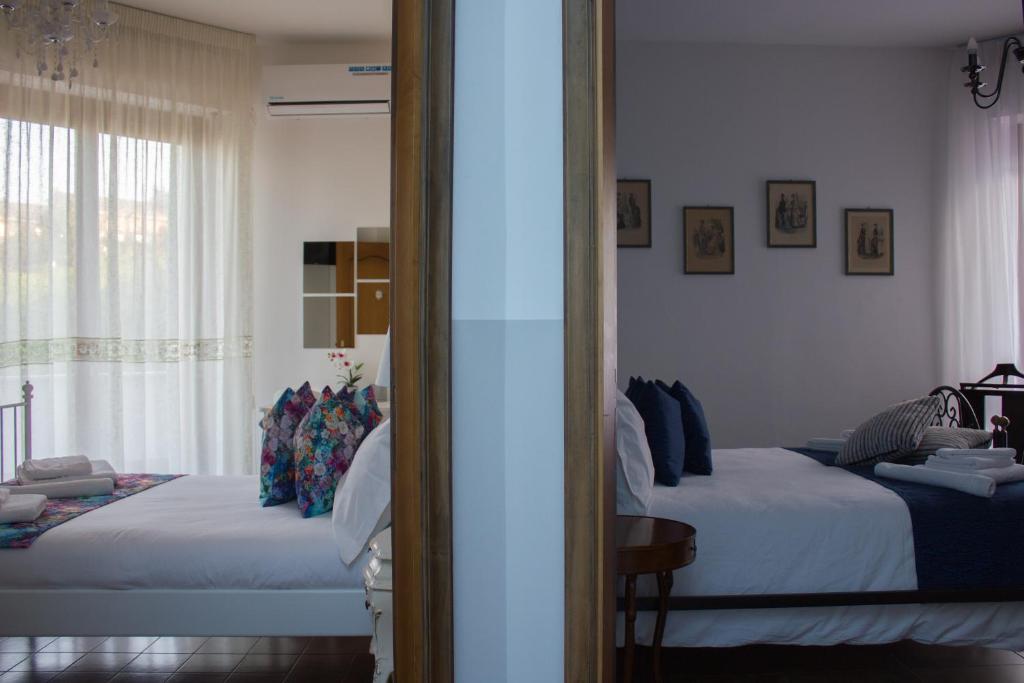 Postel nebo postele na pokoji v ubytování City View Pescara B&B