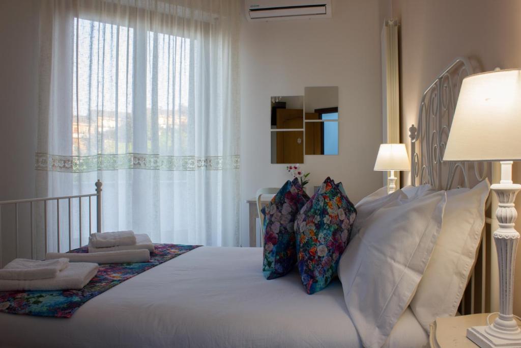 Postel nebo postele na pokoji v ubytování City View Pescara B&B