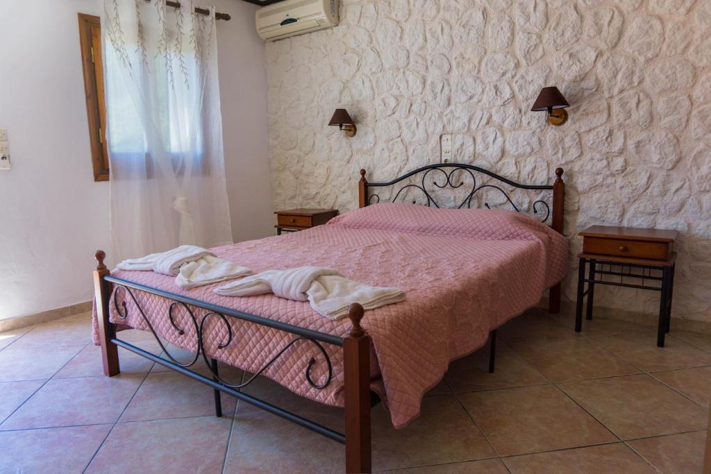 Postel nebo postele na pokoji v ubytování Venus Apartments