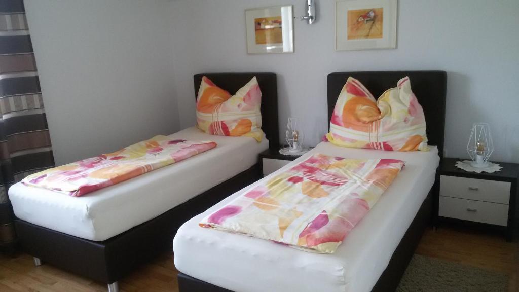 Postel nebo postele na pokoji v ubytování Appartementhaus Elfi
