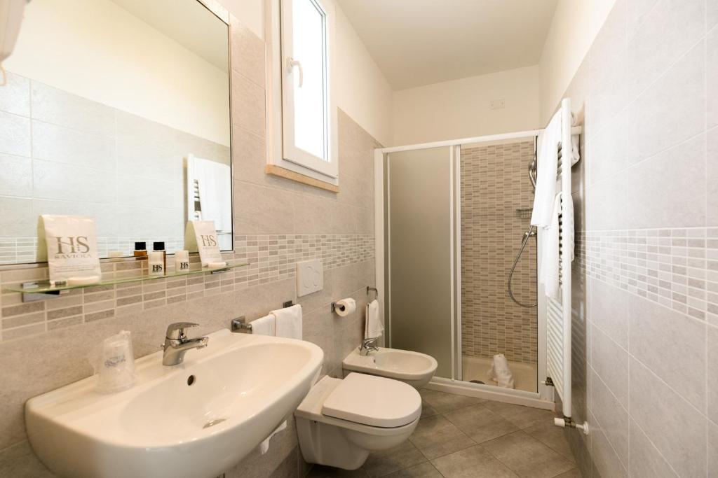 Koupelna v ubytování Hotel Saviola