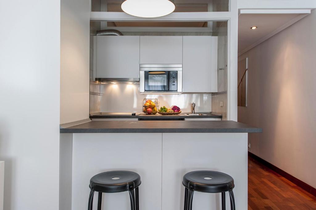 A kitchen or kitchenette at Retiro II - Tranquilidad y Estilo en el Centro