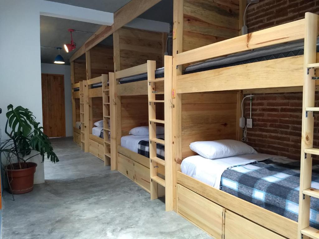 Postel nebo postele na pokoji v ubytování La Abuelita Hostal