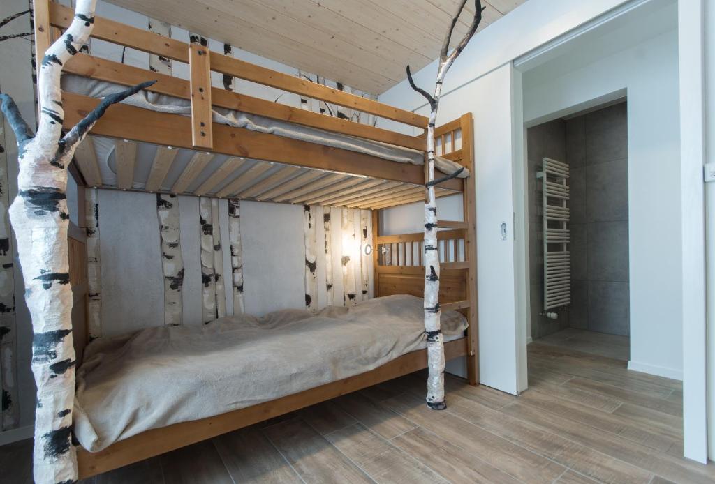 Postel nebo postele na pokoji v ubytování La Ferme des Arêtes