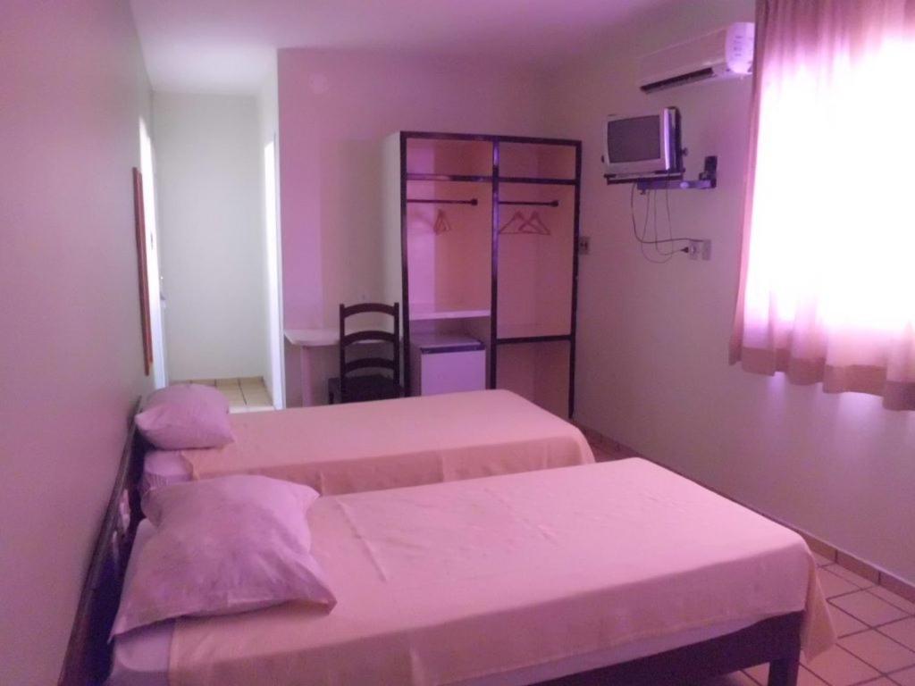 Postelja oz. postelje v sobi nastanitve Hotel Rio Mar