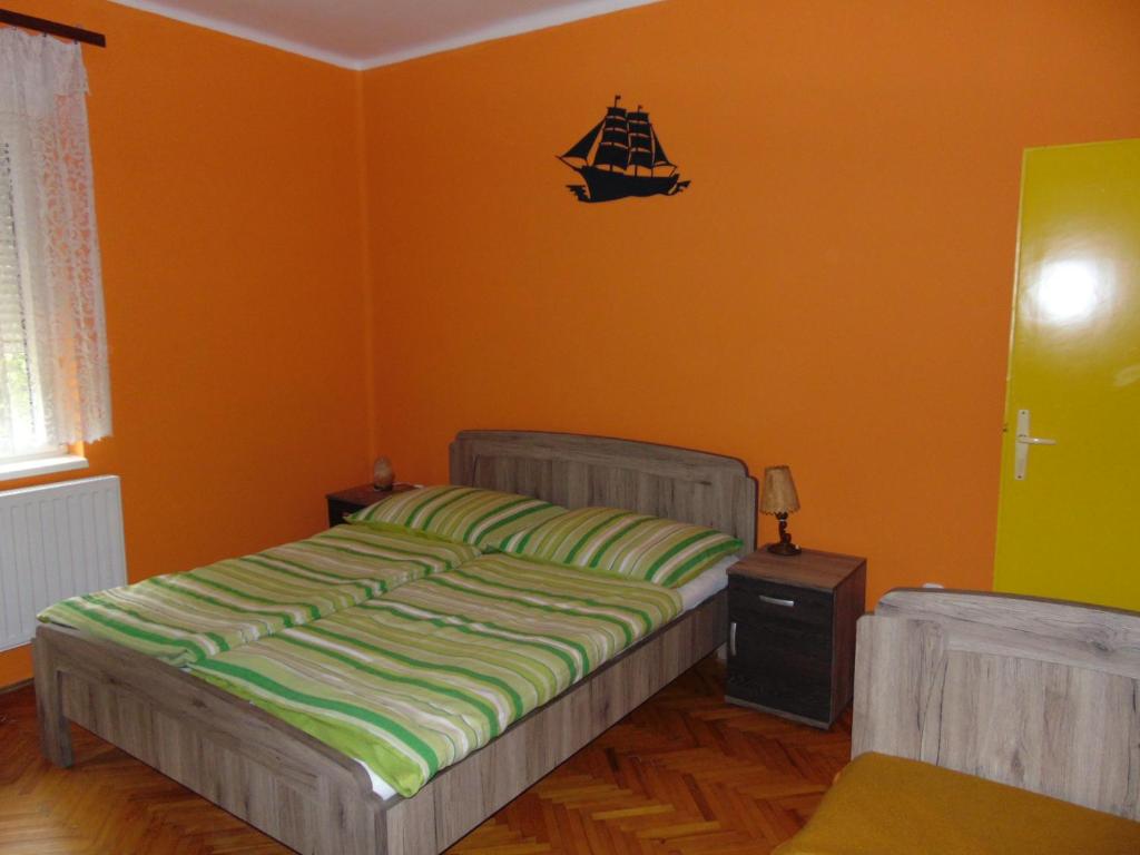 Postel nebo postele na pokoji v ubytování Székely Apartman