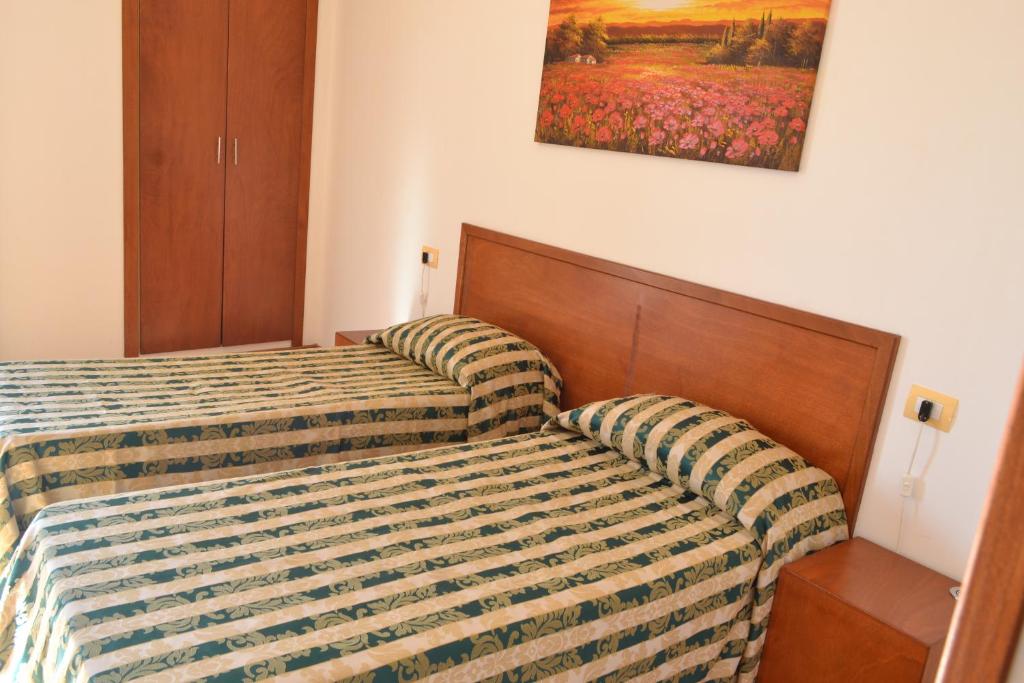 Postel nebo postele na pokoji v ubytování Hotel Nicolaj