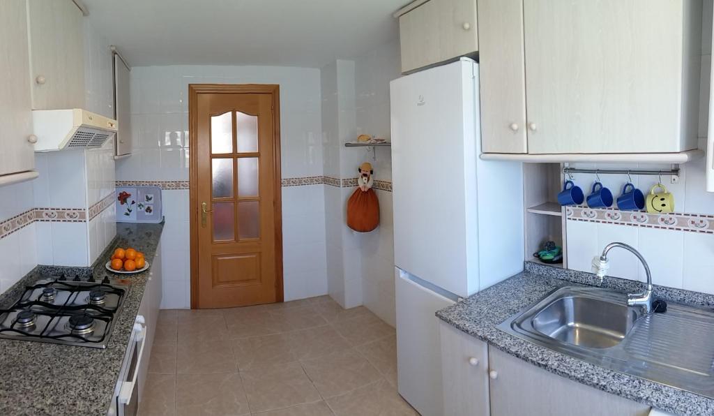 A kitchen or kitchenette at Apart. en Calpe a 150m. de la playa