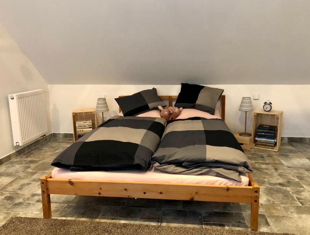 Postel nebo postele na pokoji v ubytování Guest House K74