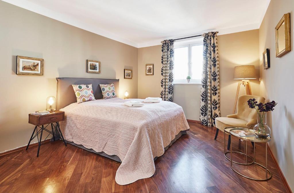 Postel nebo postele na pokoji v ubytování Vienna Penthouse 2