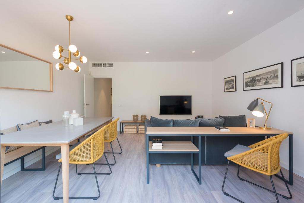 Televízia a/alebo spoločenská miestnosť v ubytovaní Petit Luxe Dúplex