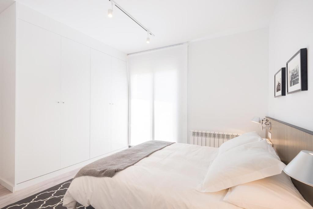 Posteľ alebo postele v izbe v ubytovaní Petit Luxe Dúplex