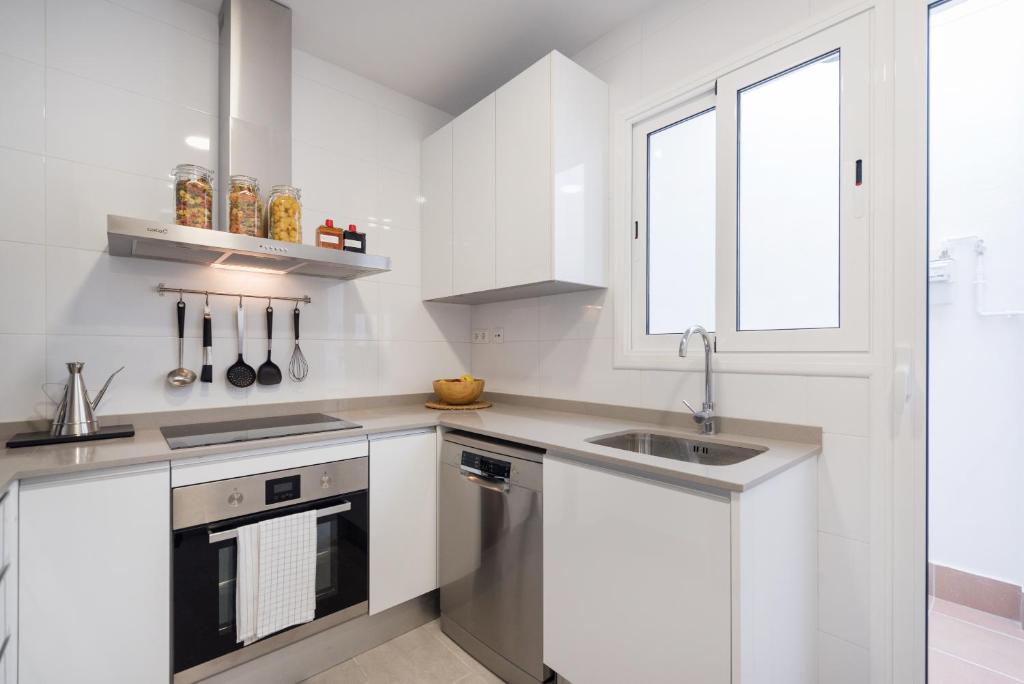 Kuchyňa alebo kuchynka v ubytovaní Petit Luxe Dúplex