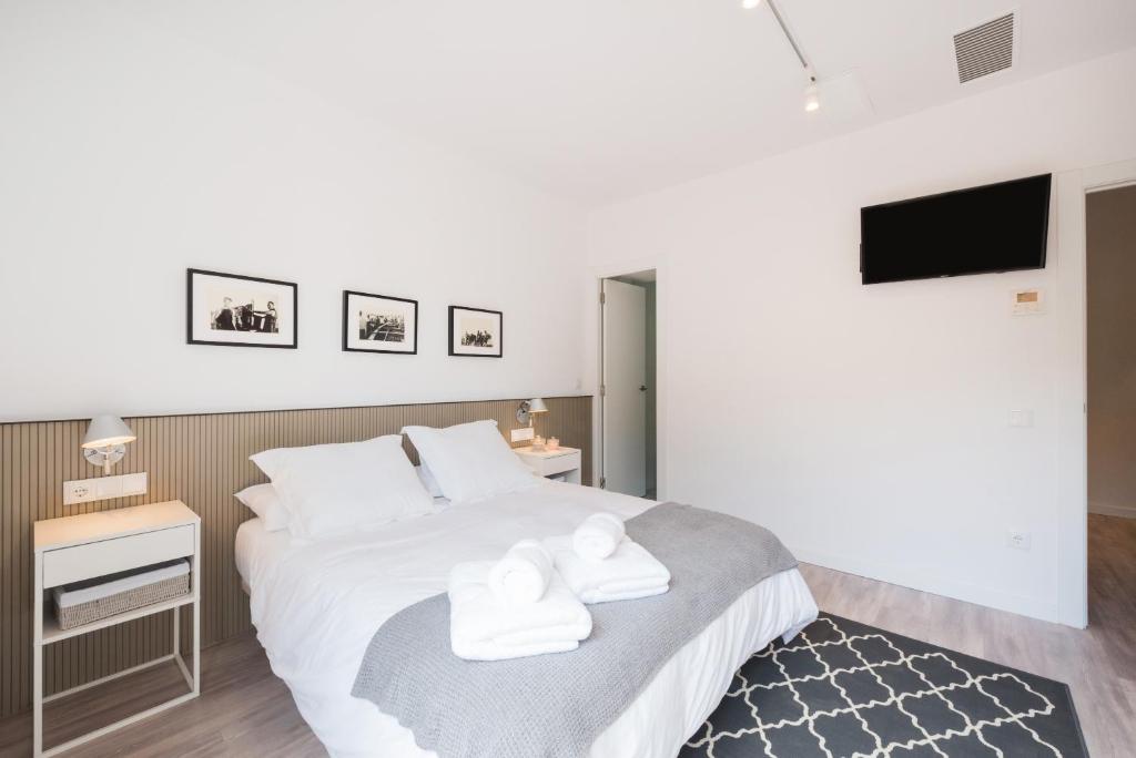Posteľ alebo postele v izbe v ubytovaní Petit Luxe Dúplex