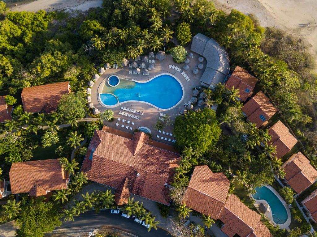 Bazén v ubytování Occidental Tamarindo - All Inclusive nebo v jeho okolí