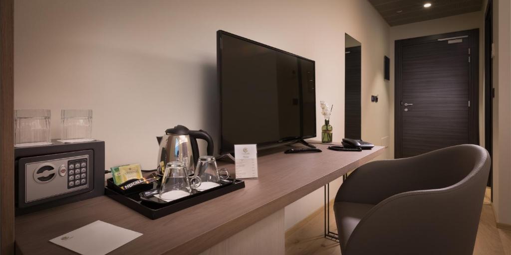 TV a/nebo společenská místnost v ubytování Hotel The Cube