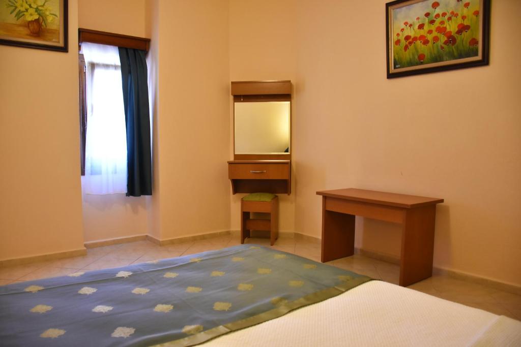 Postel nebo postele na pokoji v ubytování Aybey Apart Hotel