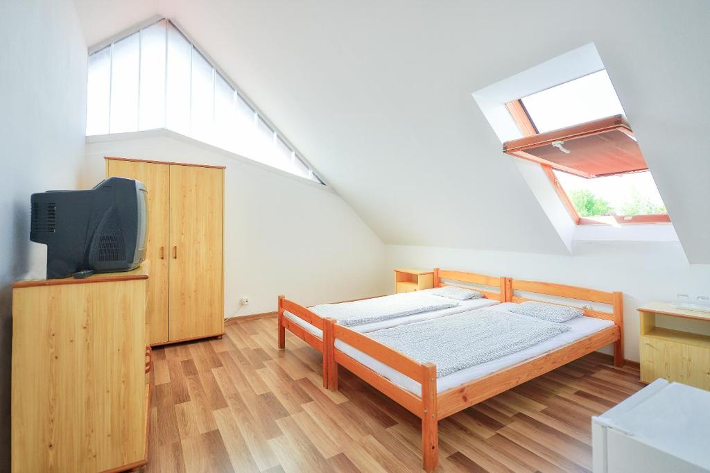 Posteľ alebo postele v izbe v ubytovaní Oliver Inn