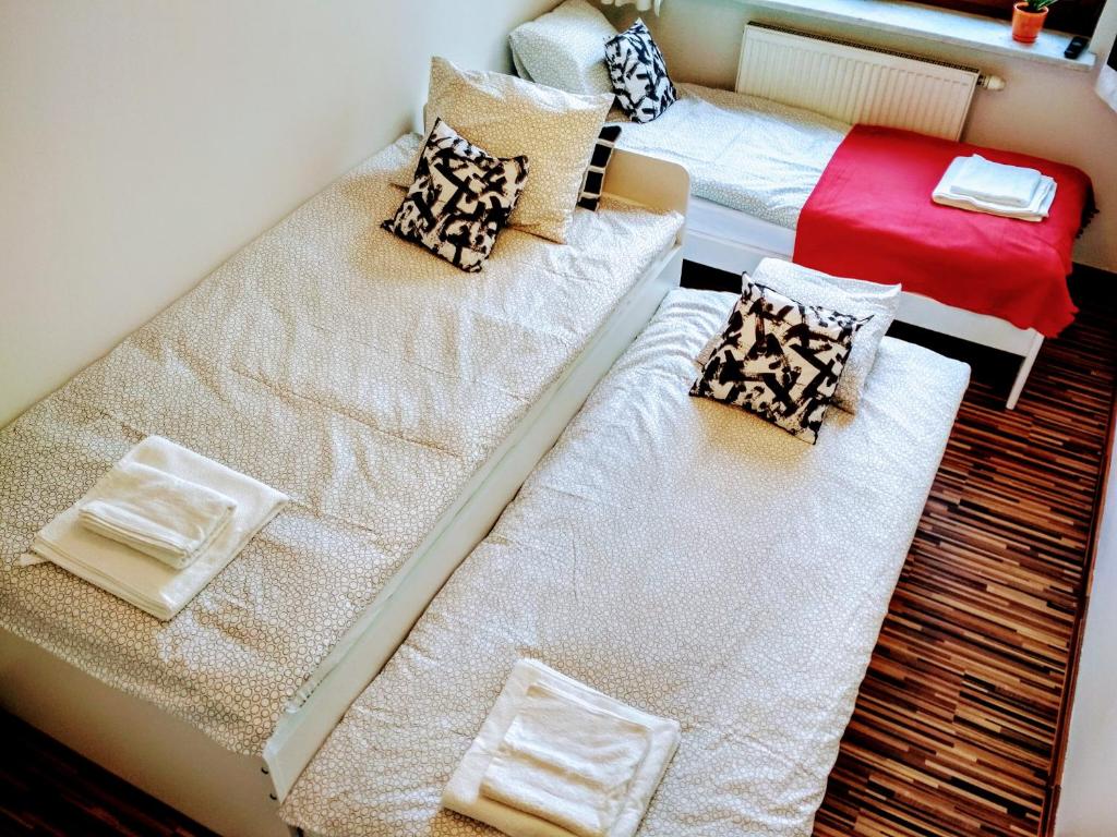 Posteľ alebo postele v izbe v ubytovaní Vitalia Apart Rooms Bobrowiecka