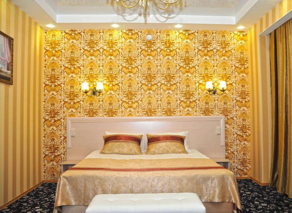 Ліжко або ліжка в номері Kontinent Hotel