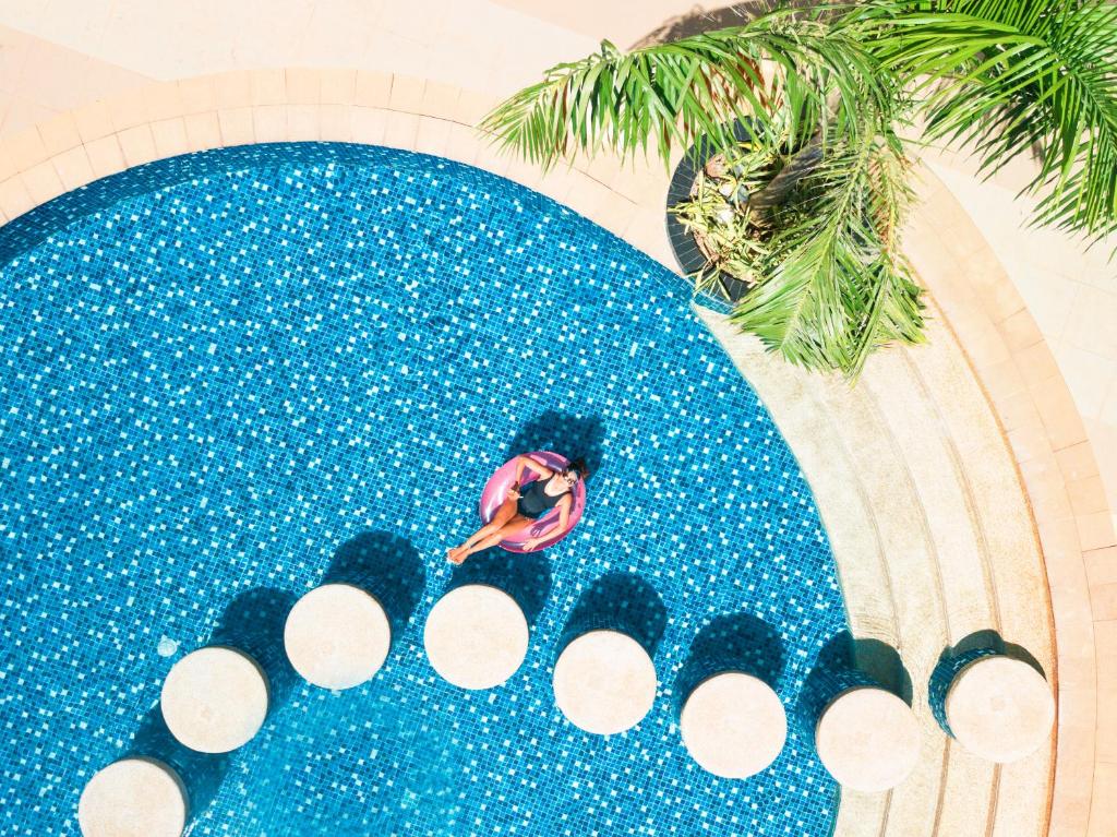 Bazén v ubytování Savoy Hotel Boracay Newcoast nebo v jeho okolí