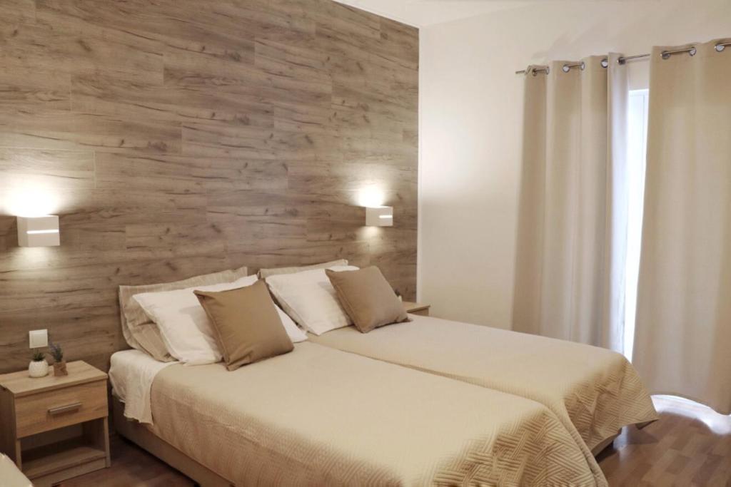 Postel nebo postele na pokoji v ubytování Hotel Orion
