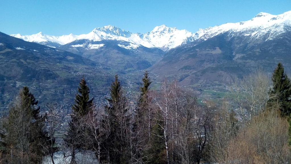 a view of a mountain range with snow covered mountains at A casa di Martina - CIR 0051 in Aosta