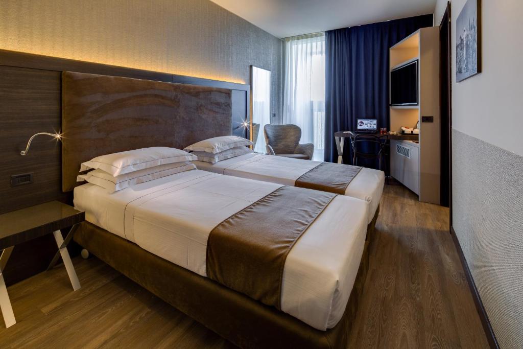 Letto o letti in una camera di Best Western Plus Hotel Farnese